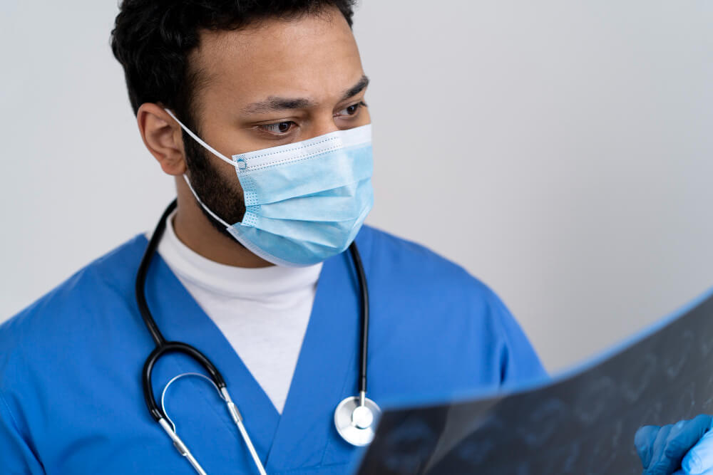 Doctor looking at reports